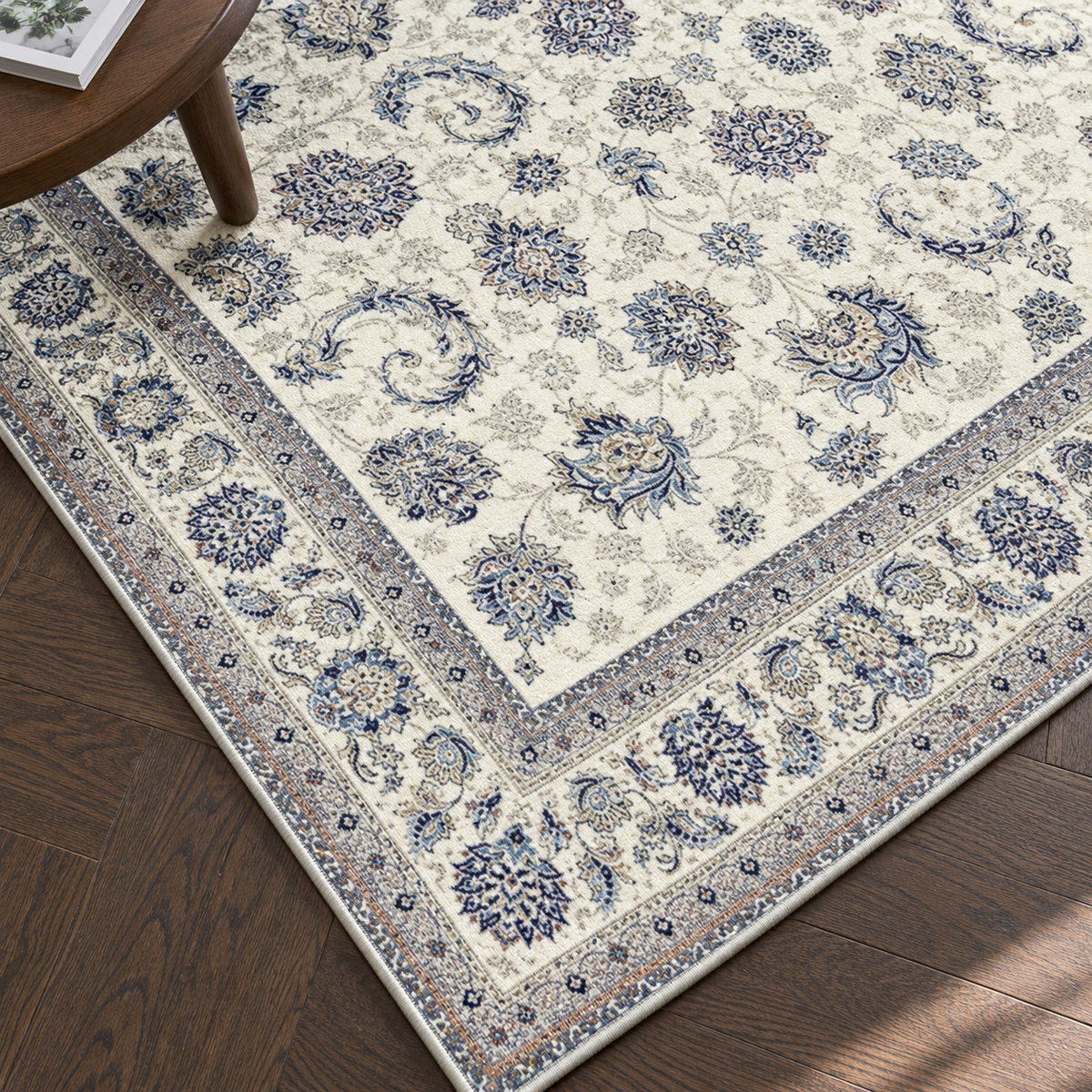 Détail du motif et de la bordure du tapis Azélie, vu du dessus