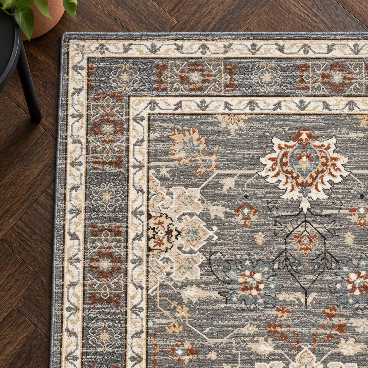 Détail du motif et de la bordure du tapis Céleste, vu du dessus