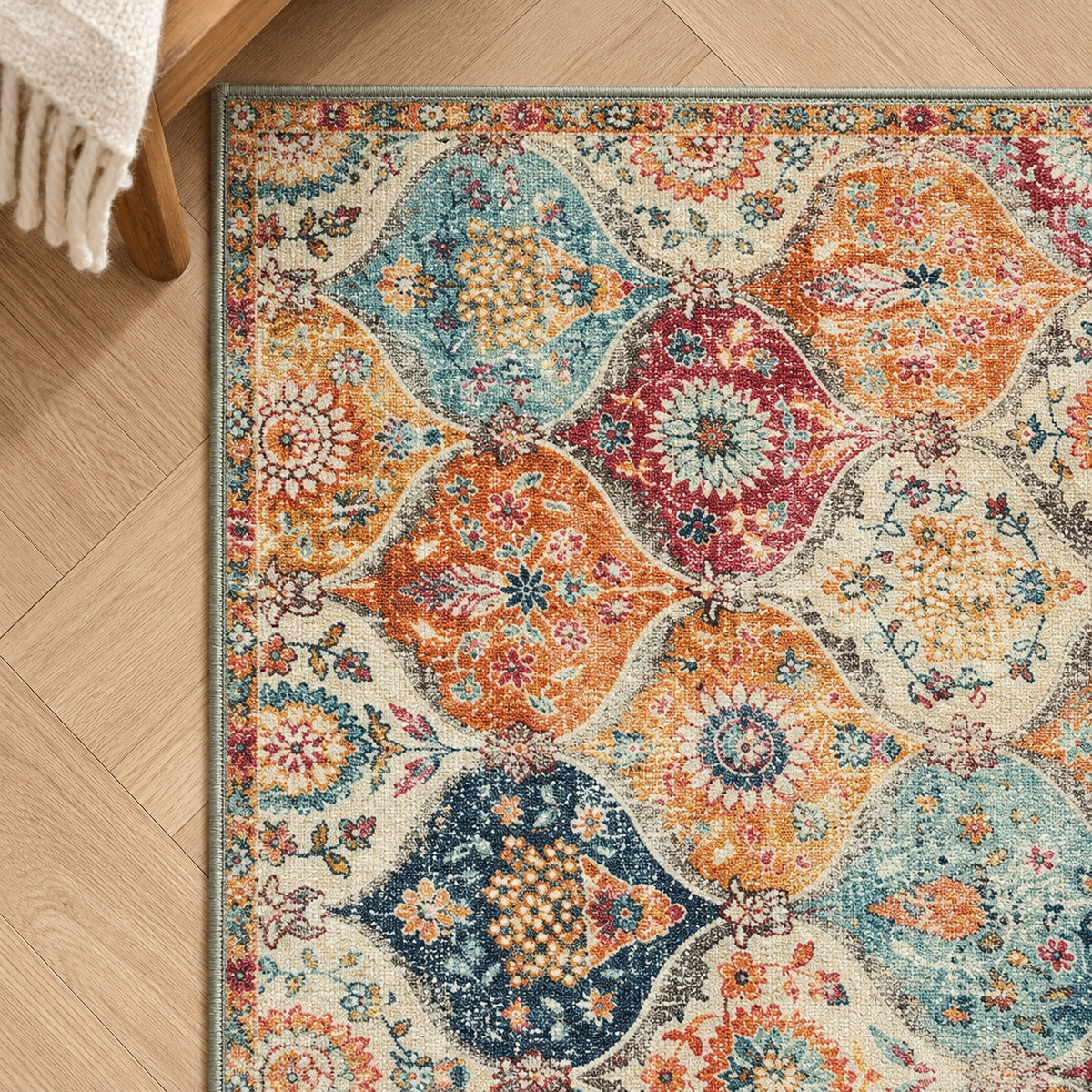 Détail du motif et de la bordure du tapis Nora, vu du dessus